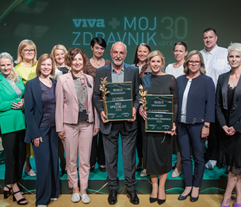 Ekipa zdravstvenih zavarovanj v zavarovalnici Generali na podelitvi priznanj zdravnikom.